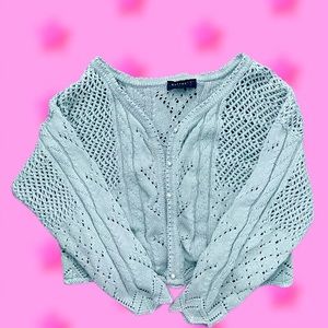 Rafferty knitted coat. Very cute and has faux pearl buttons!!